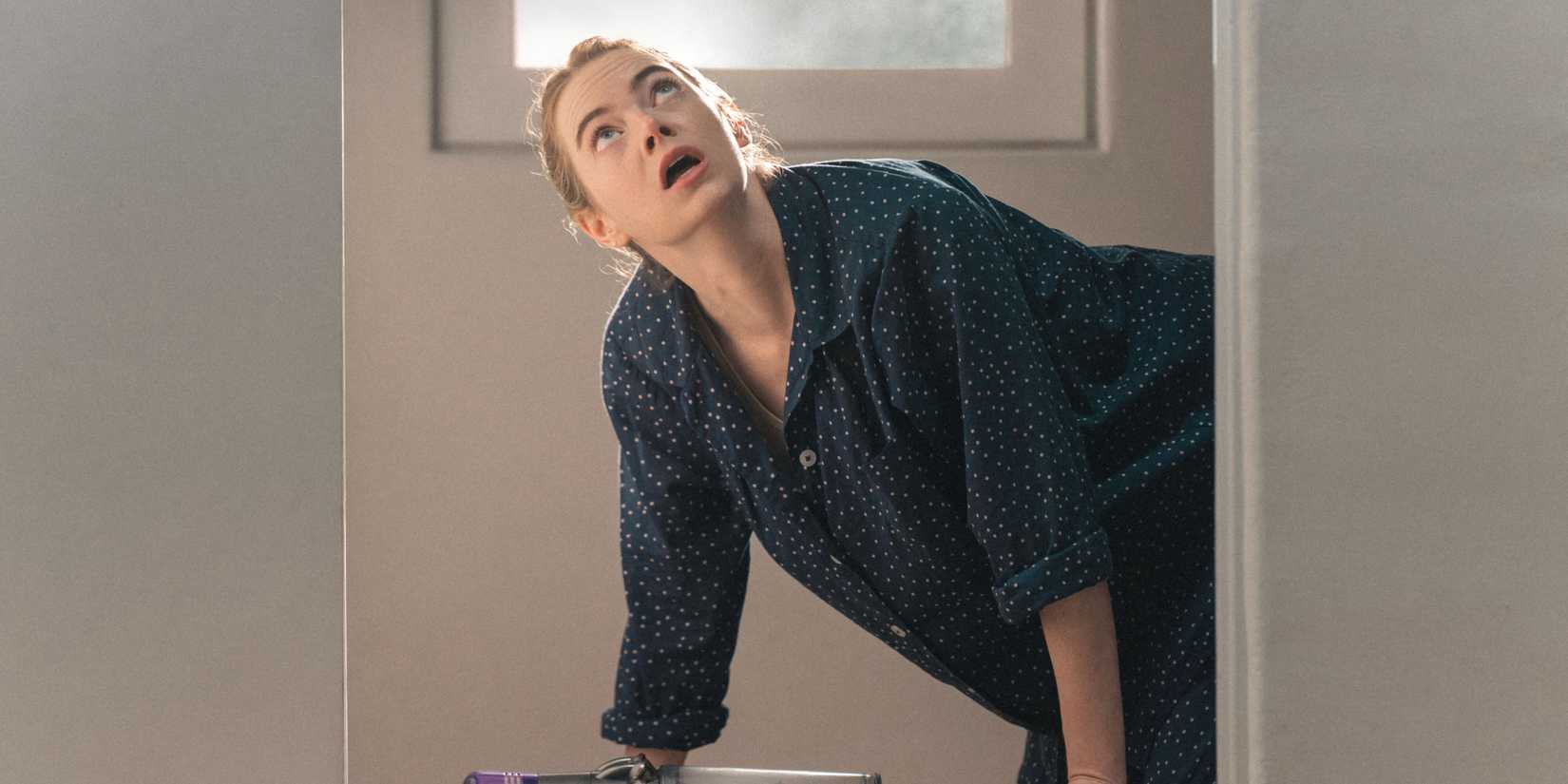 Whitney (Emma Stone) looking up in horror in The Curse finale.