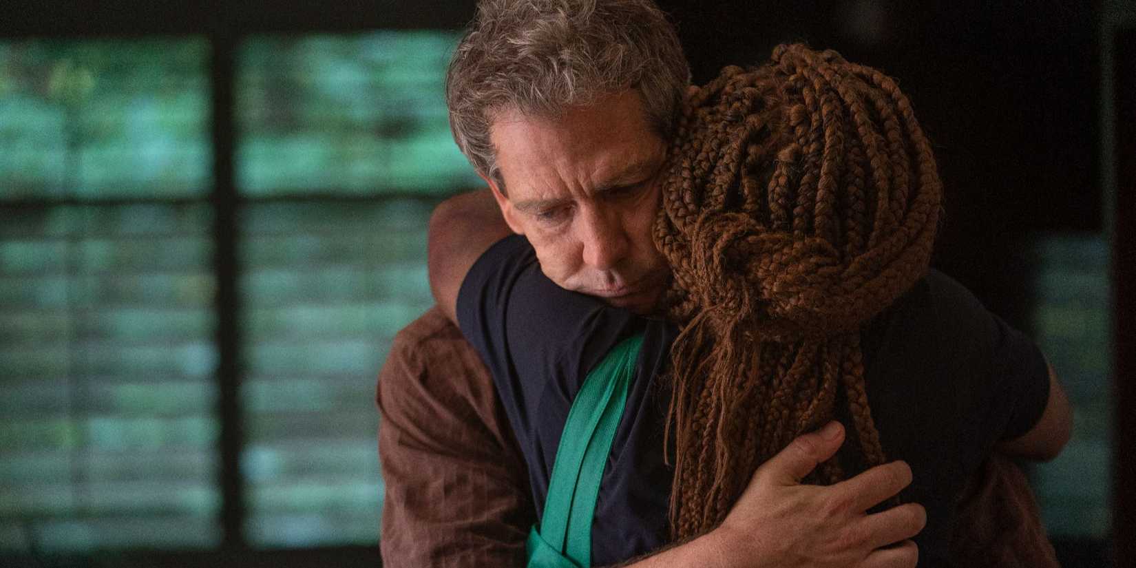 Ralph (Ben Mendelsohn) hugging Holly (Cynthia Erivo) in The Outsider series finale.