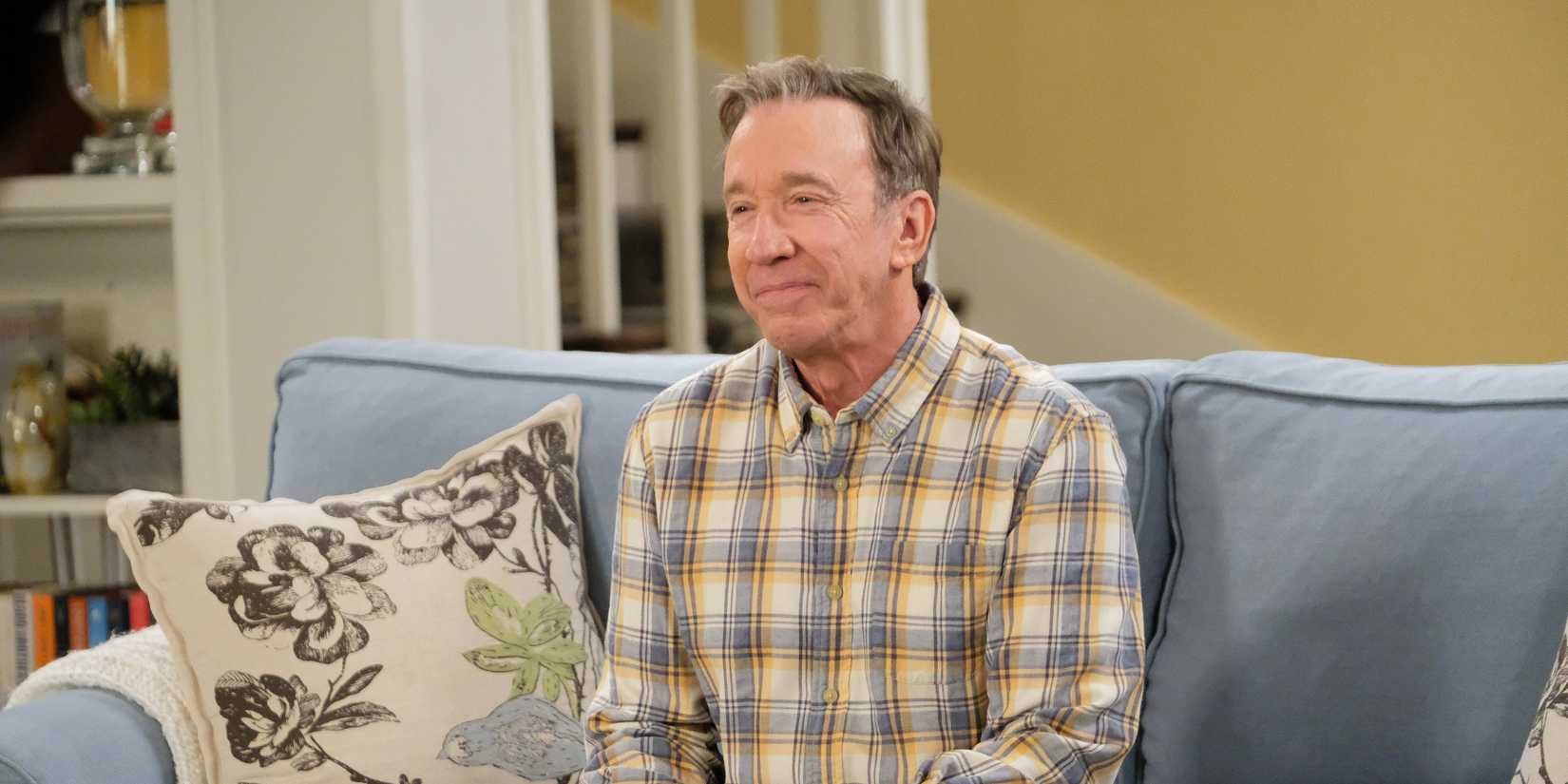 Tim Allen on a couch in Last Man Standing