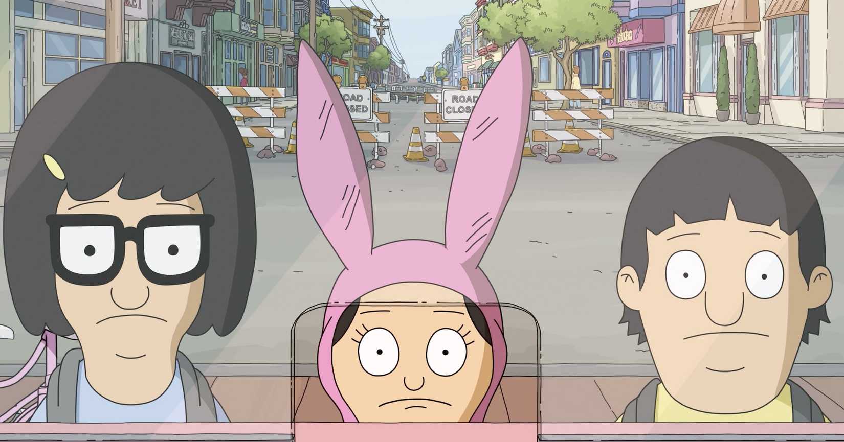 Tina Louise and Gene stand at a ticket booth in Bob's Burgers (Image courtesy of Everett)