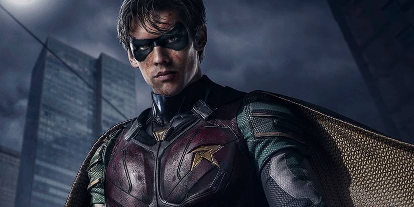 тιтans Robin season 1 poster of him standing in front of a building