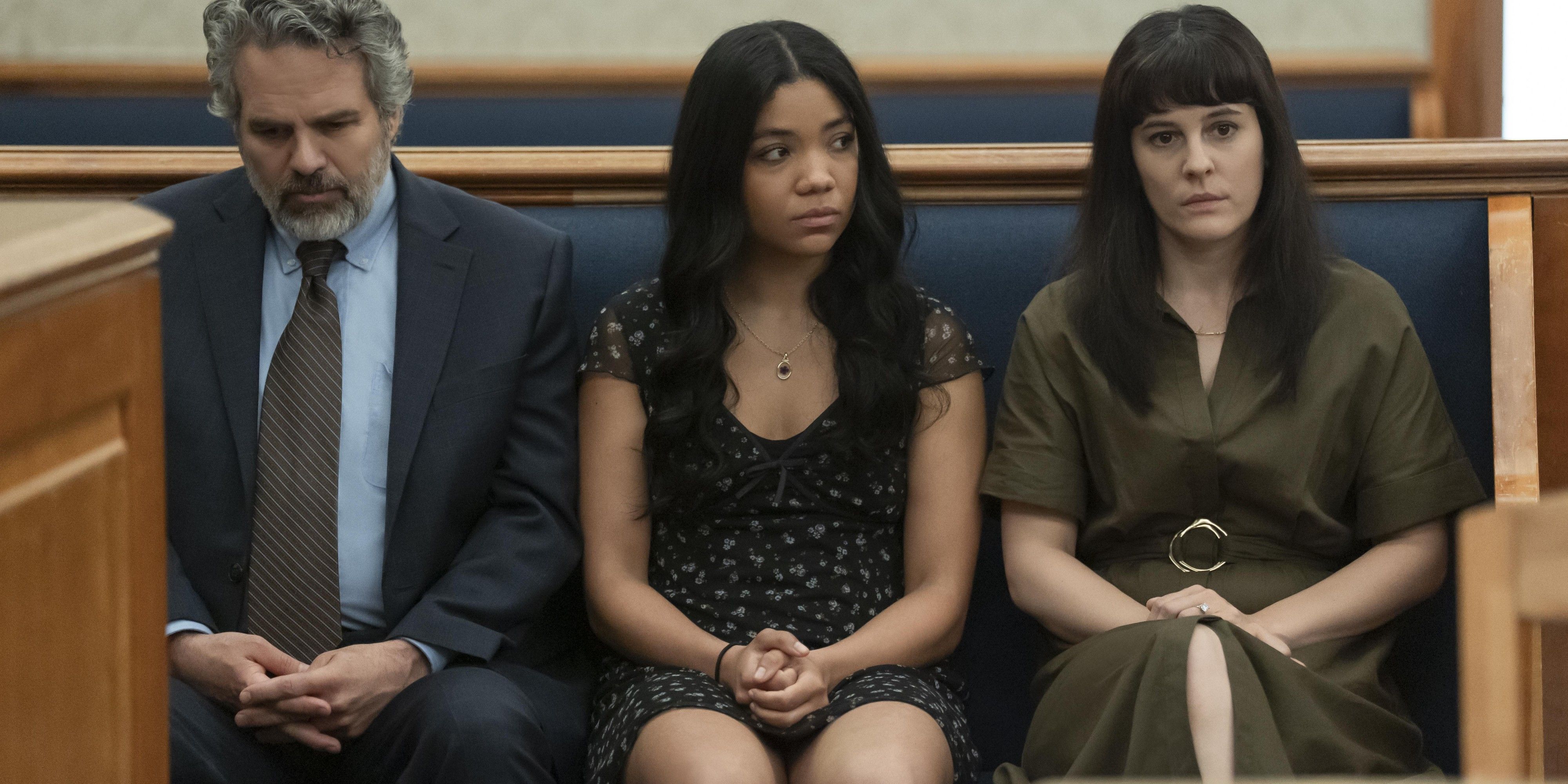 Tom and his family sitting in court