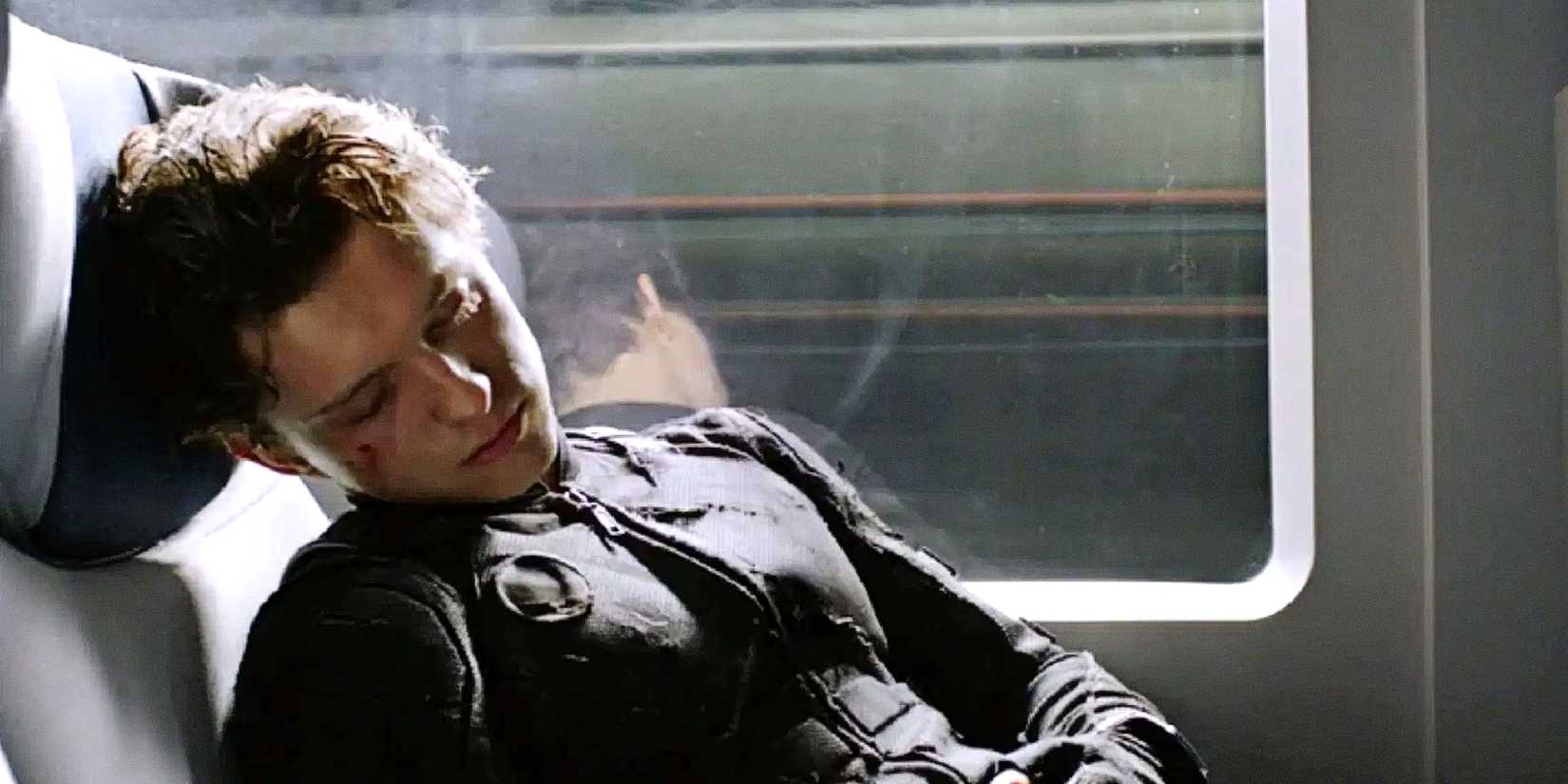 Tom Holland's Peter Parker lies unconscious on a train in Spider-Man Far From Home