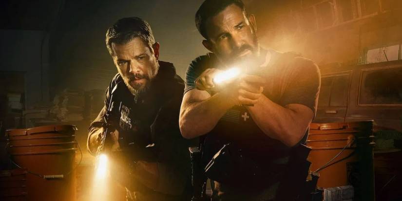 Two cops holding flashlights on the poster for The Rip