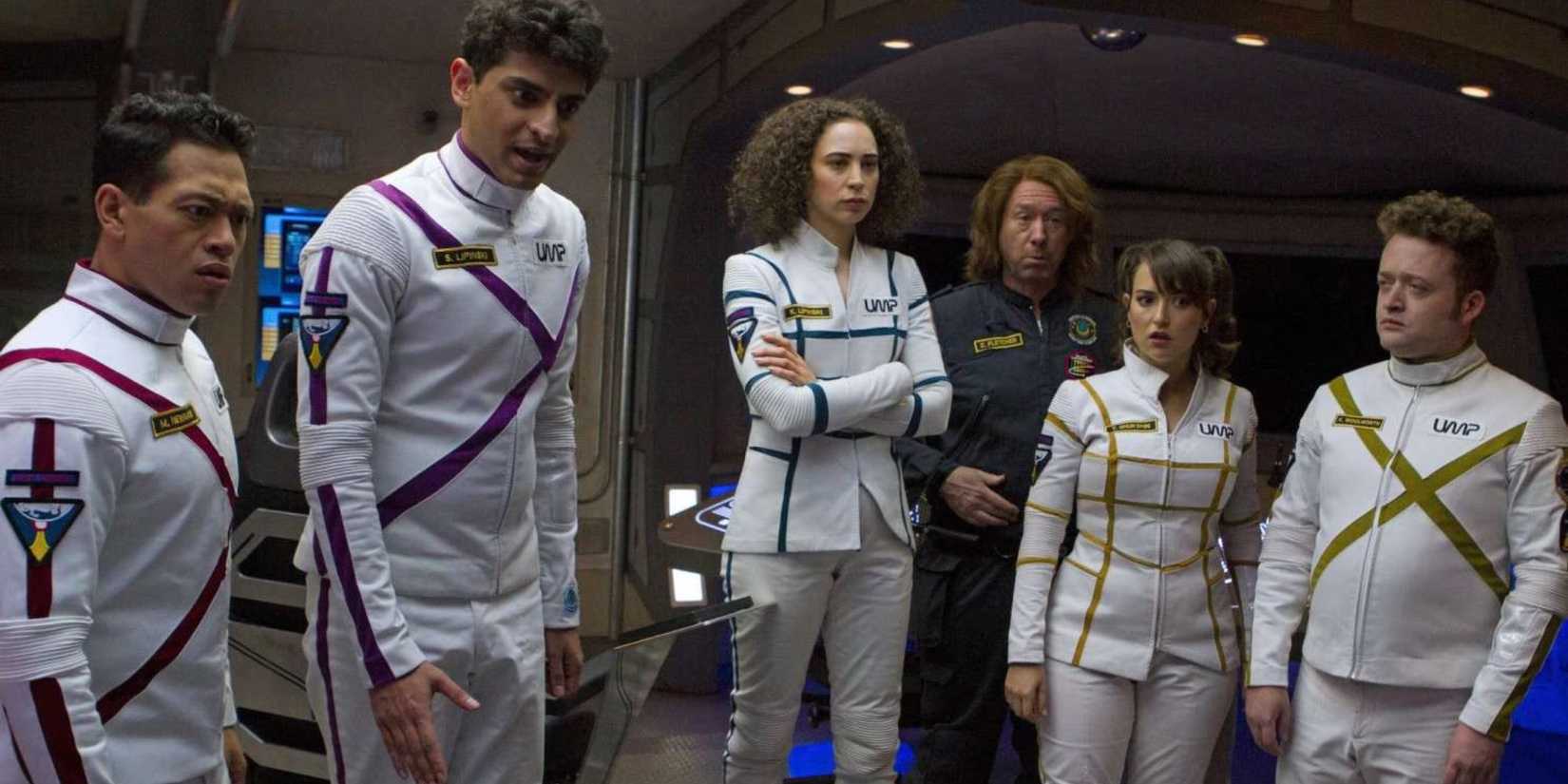 The UMP Cruiser crew looking confused as they stand around the ship together mid-flight in Other Space.