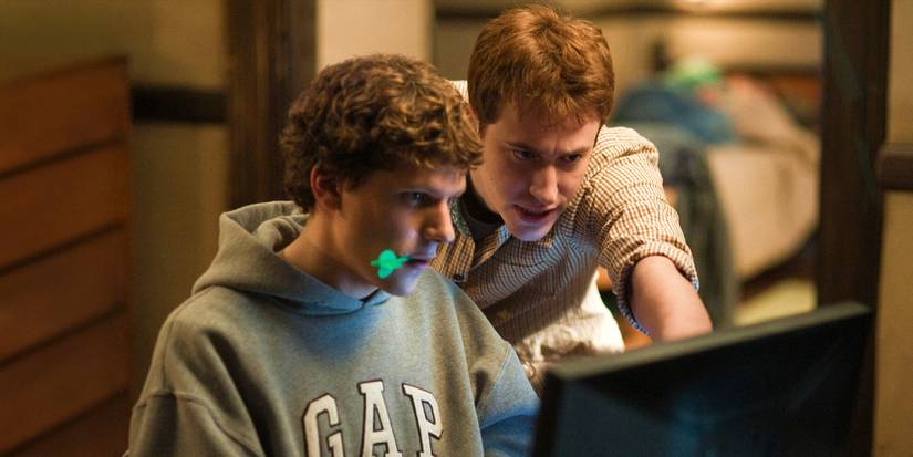 Jesse Eisenberg as Mark Zuckerberg in front of a computer in The Social Network