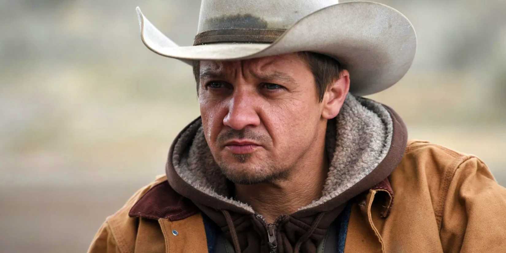 Jeremy Renner wearing a cowboy hat in Wind River