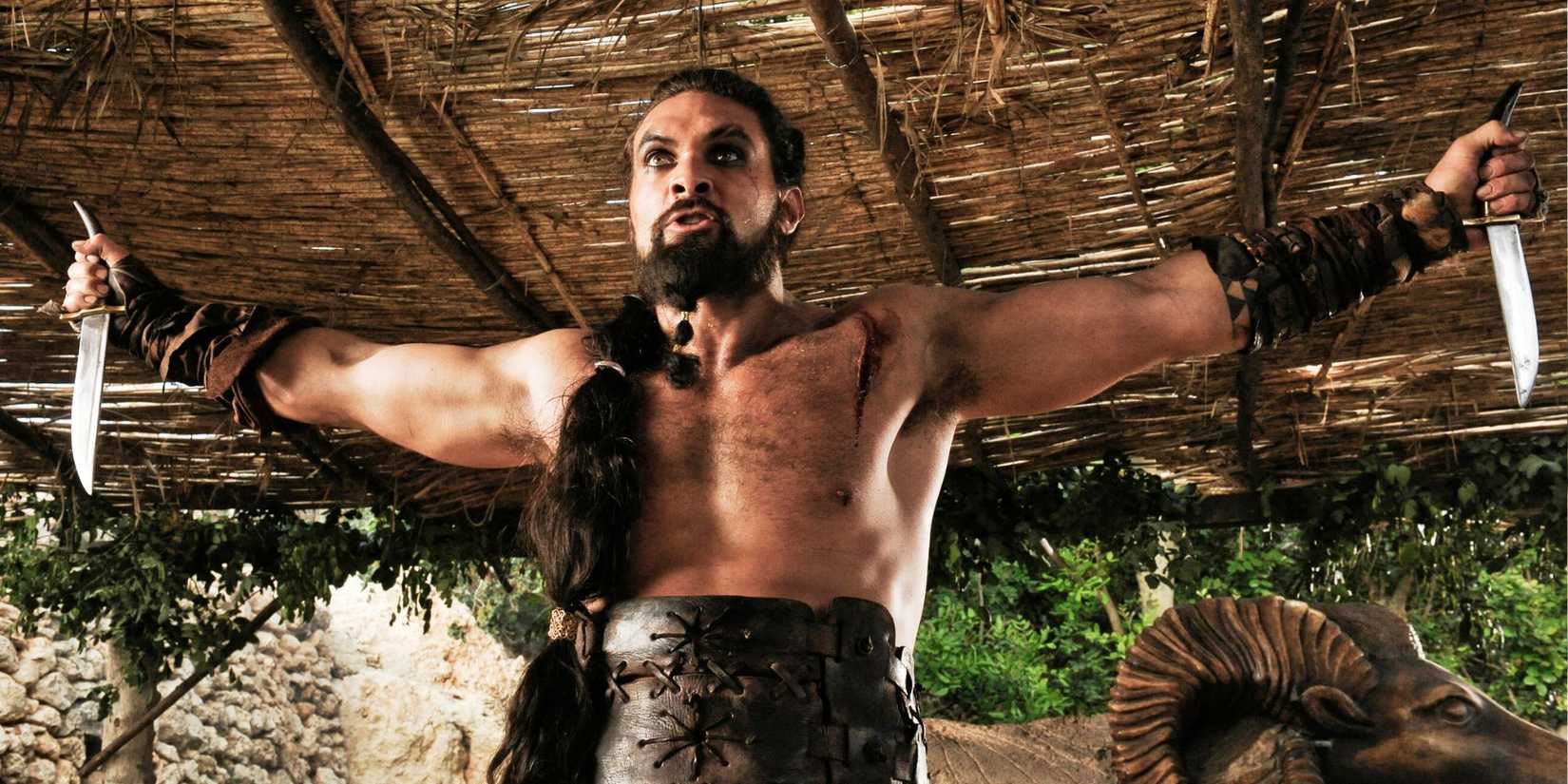 Jason Momoa as Khal Drogo with a dagger in each hand