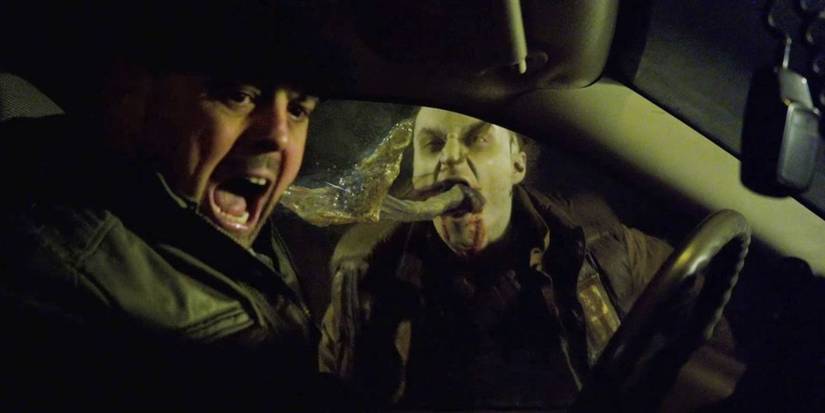 A strigoi stinging someone through a car window in The Strain