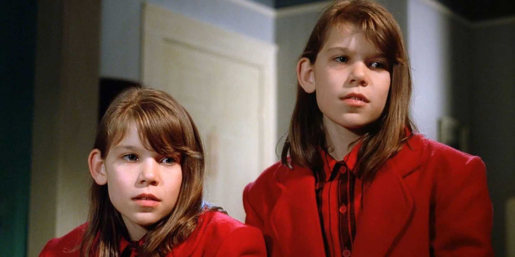 The cloned Eve twins wearing red jackets in The X-Files episode Eve