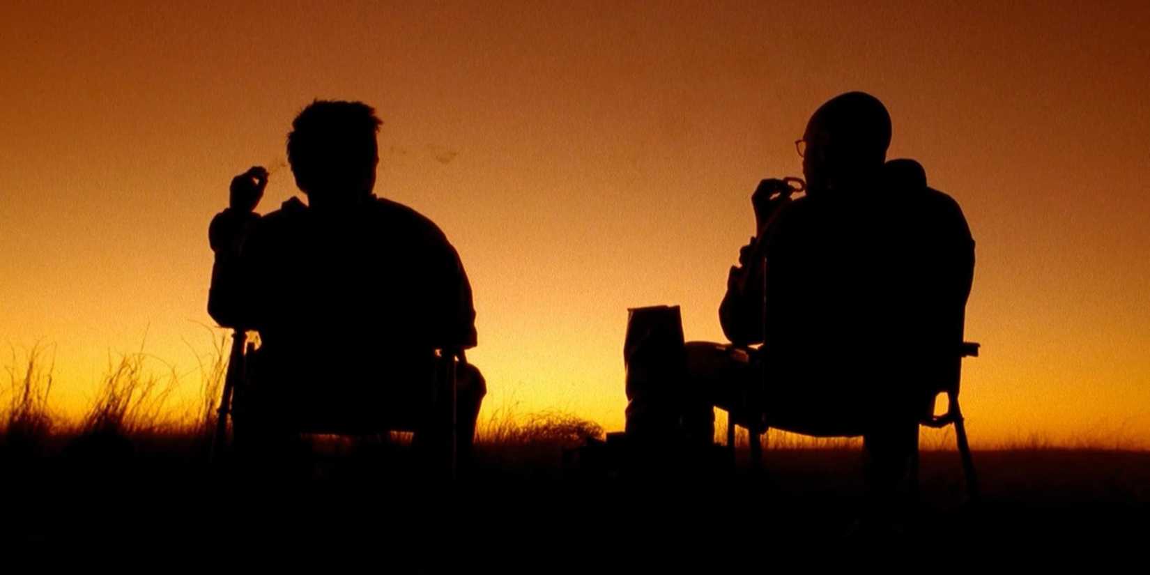 Walt and Jesse eating Funyuns in the desert in Breaking Bad