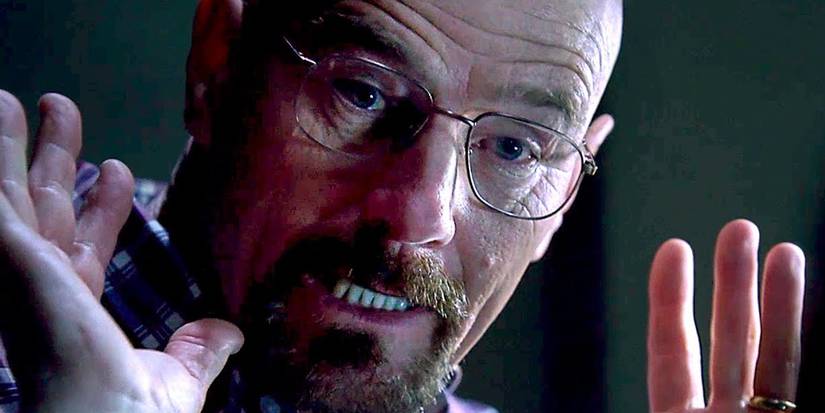 Walt puts his hands up in Breaking Bad