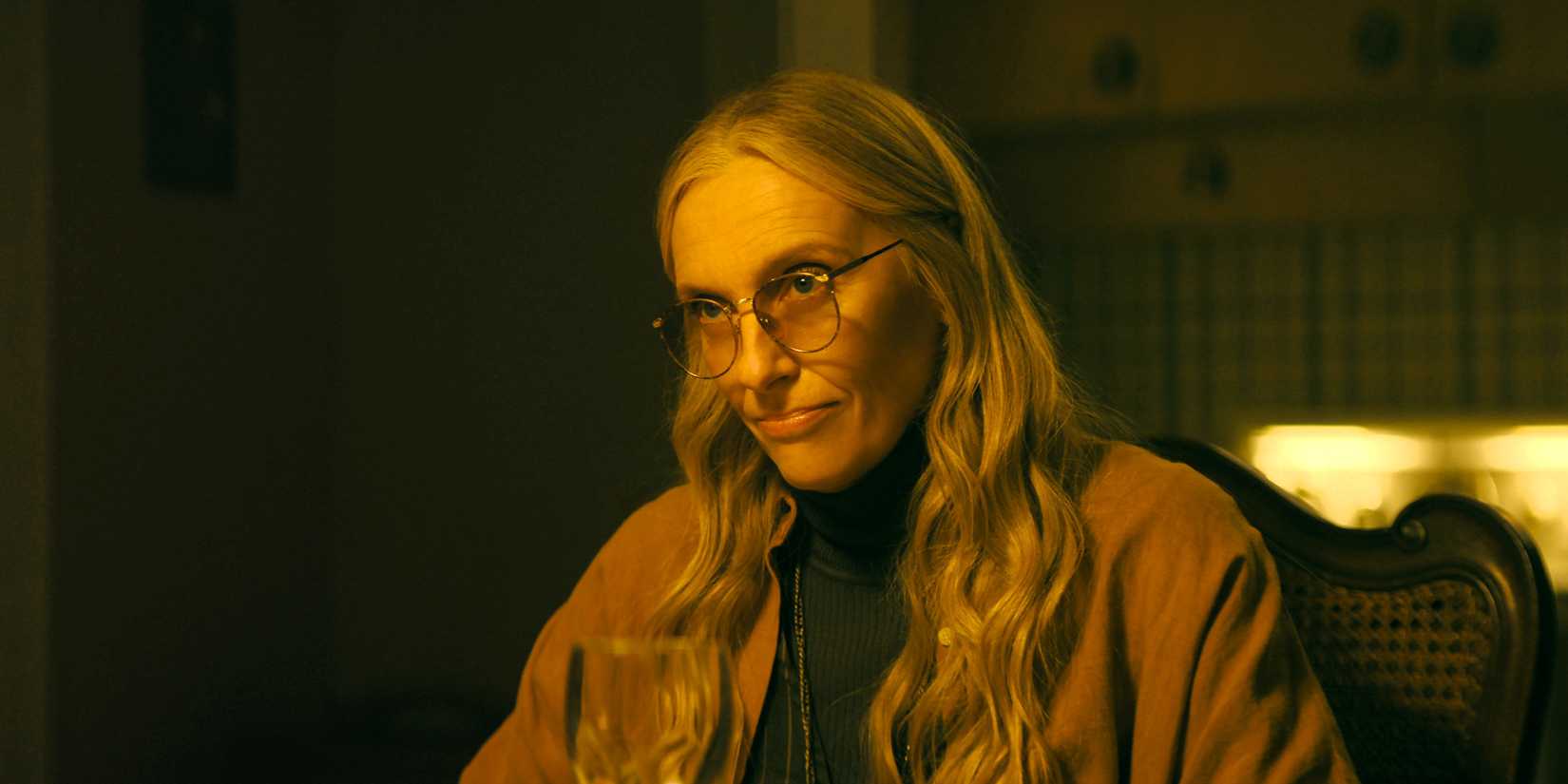 Evelyn Wade looks sinister while sitting in a chair in episode 2 of Wayward