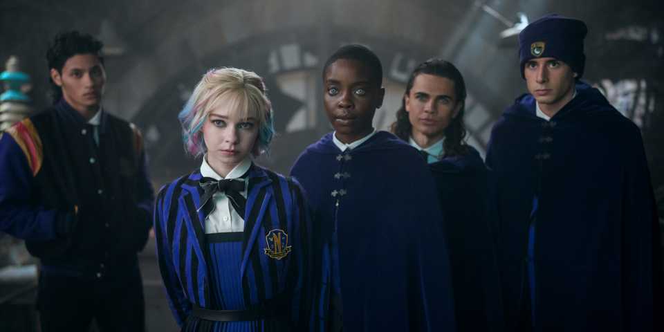 Bruno, Bianca, Kent, and Ajax stand behind Enid in Wednesday season 2 part 2