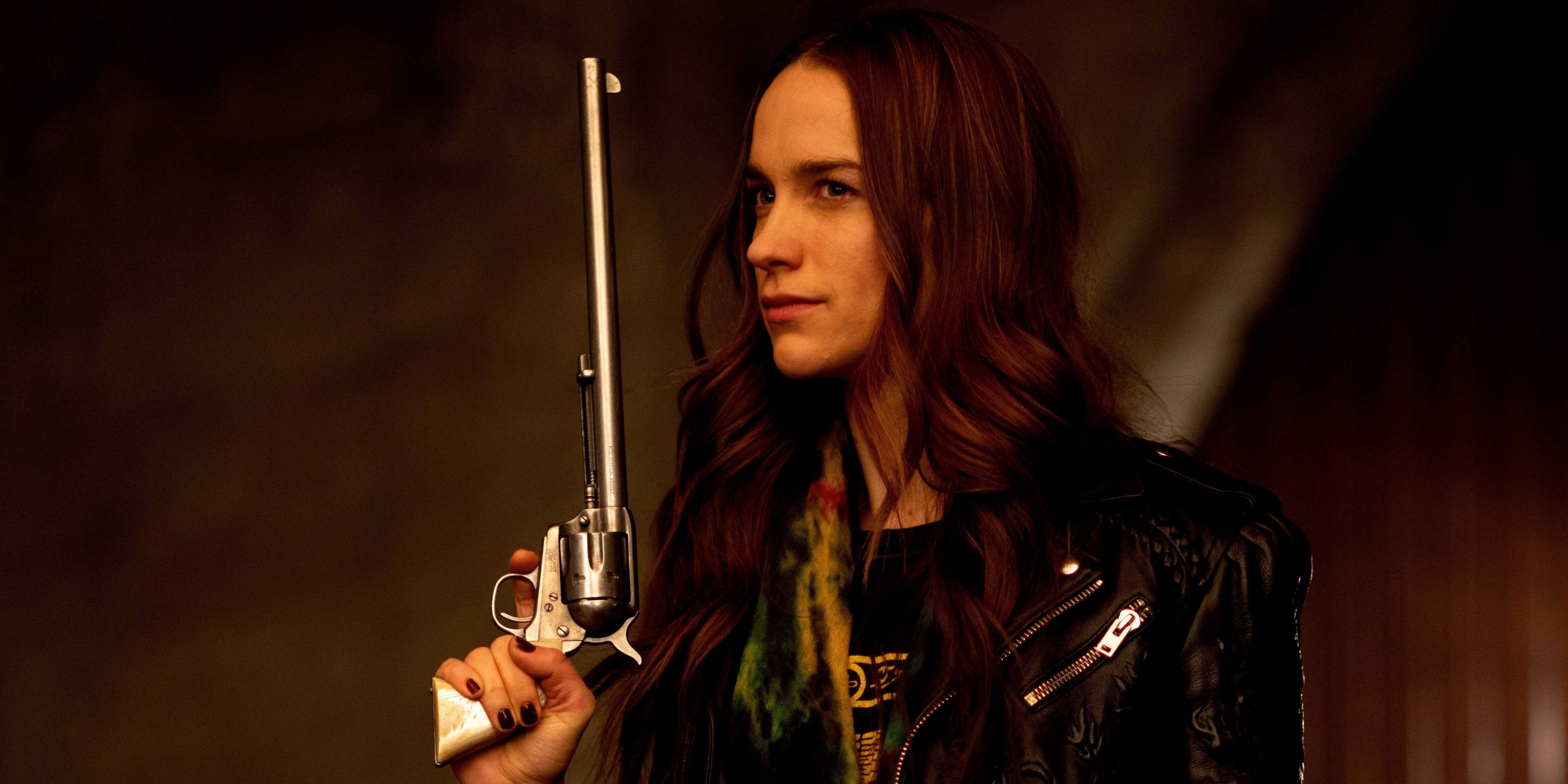 Wynonna Earp segurando a arma Peacemaker
