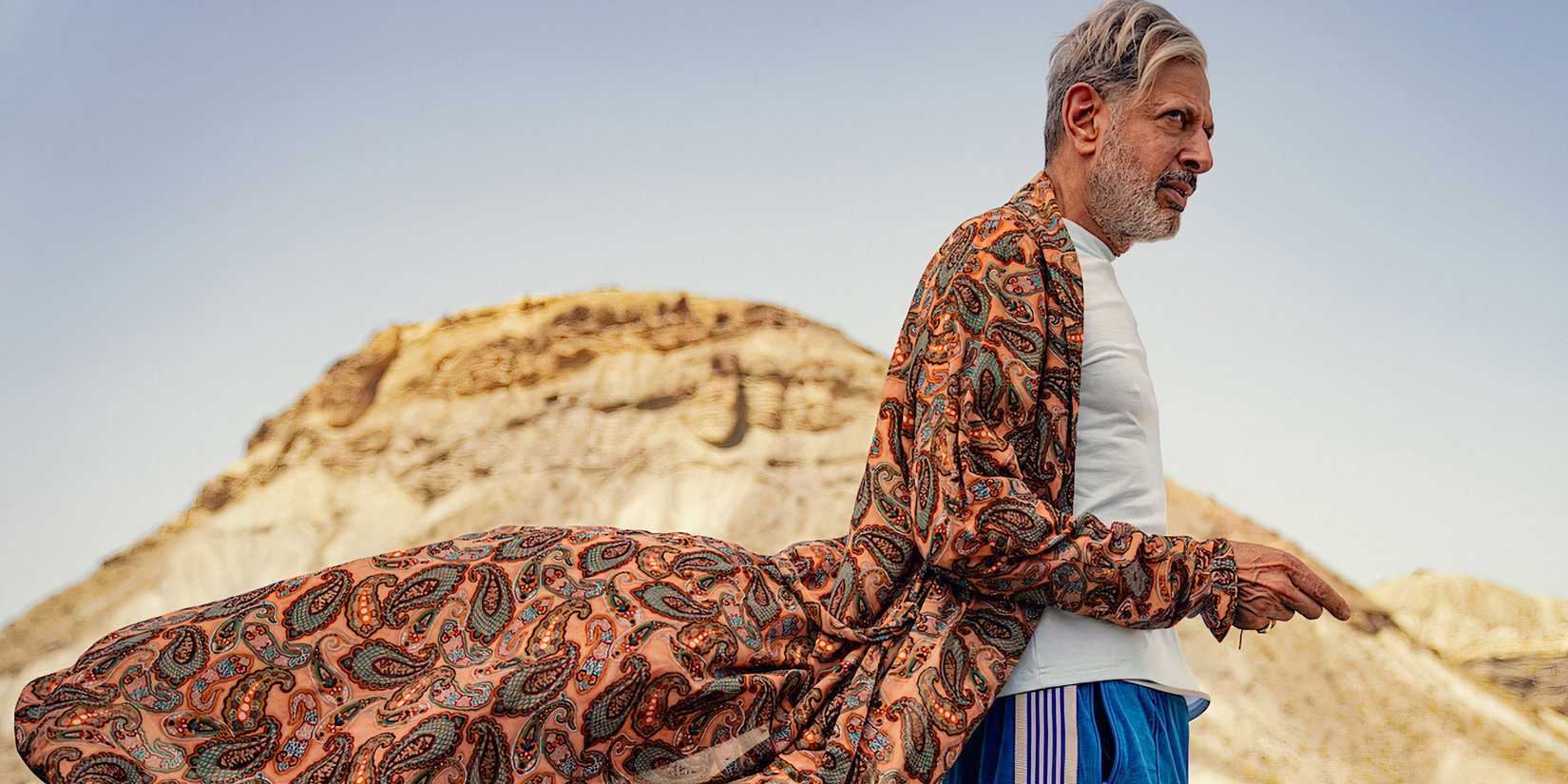 Zeus standing in front of a mountain in Kaos on Netflix