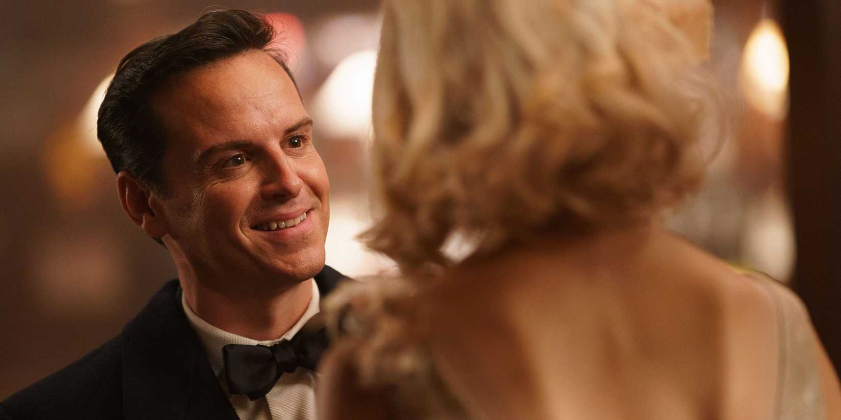 Andrew Scott smiling at Margaret Qualley in Blue Moon