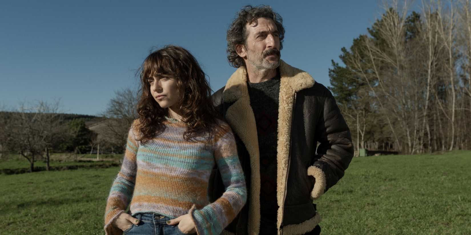 Anton and Uxia standing next to each other in a field in Old Dog New Tricks