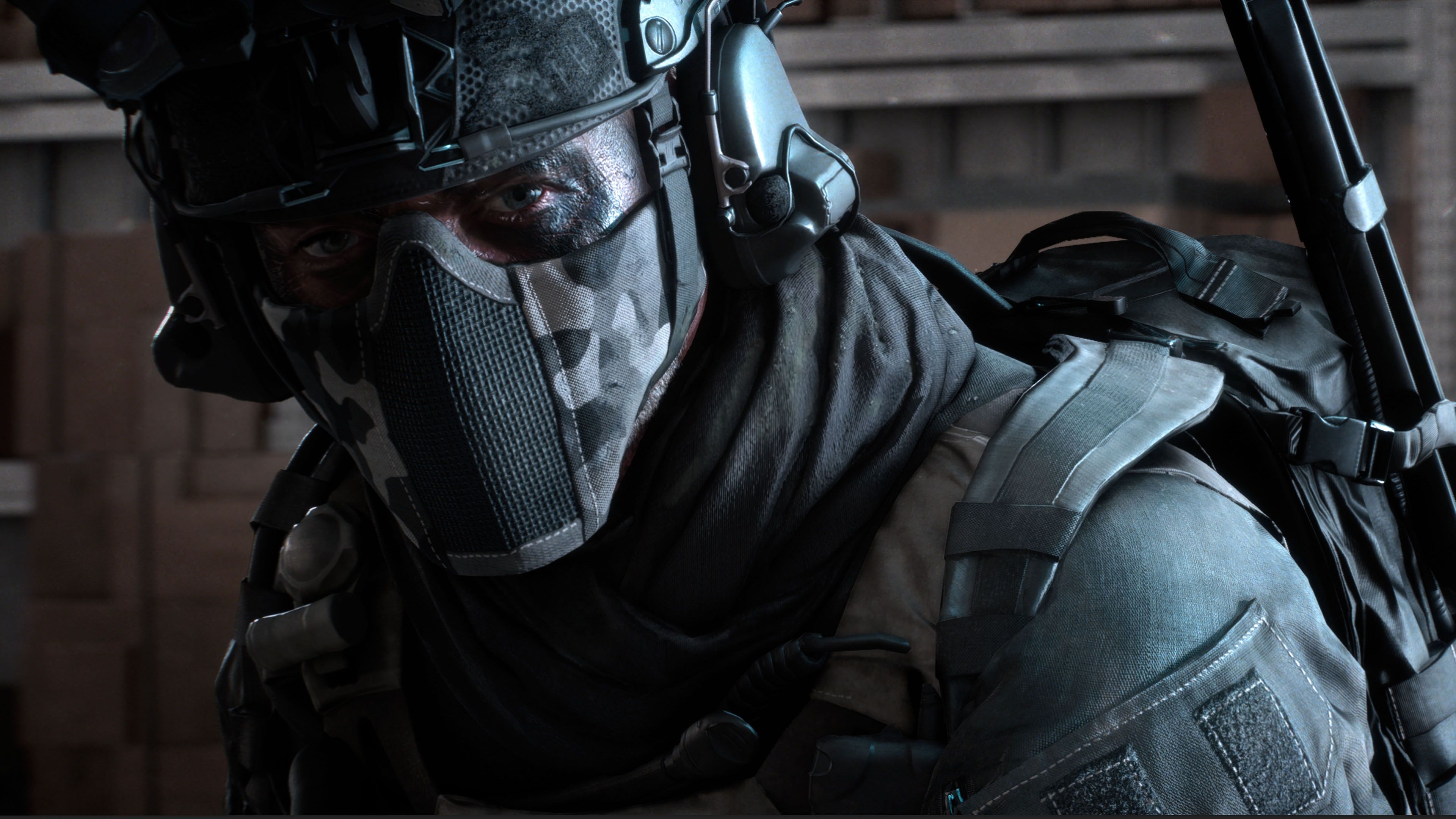 A close-up on Battlefield 6's Hemlock, who wears a mask covering most of his face and eye black obscuring what can be seen.