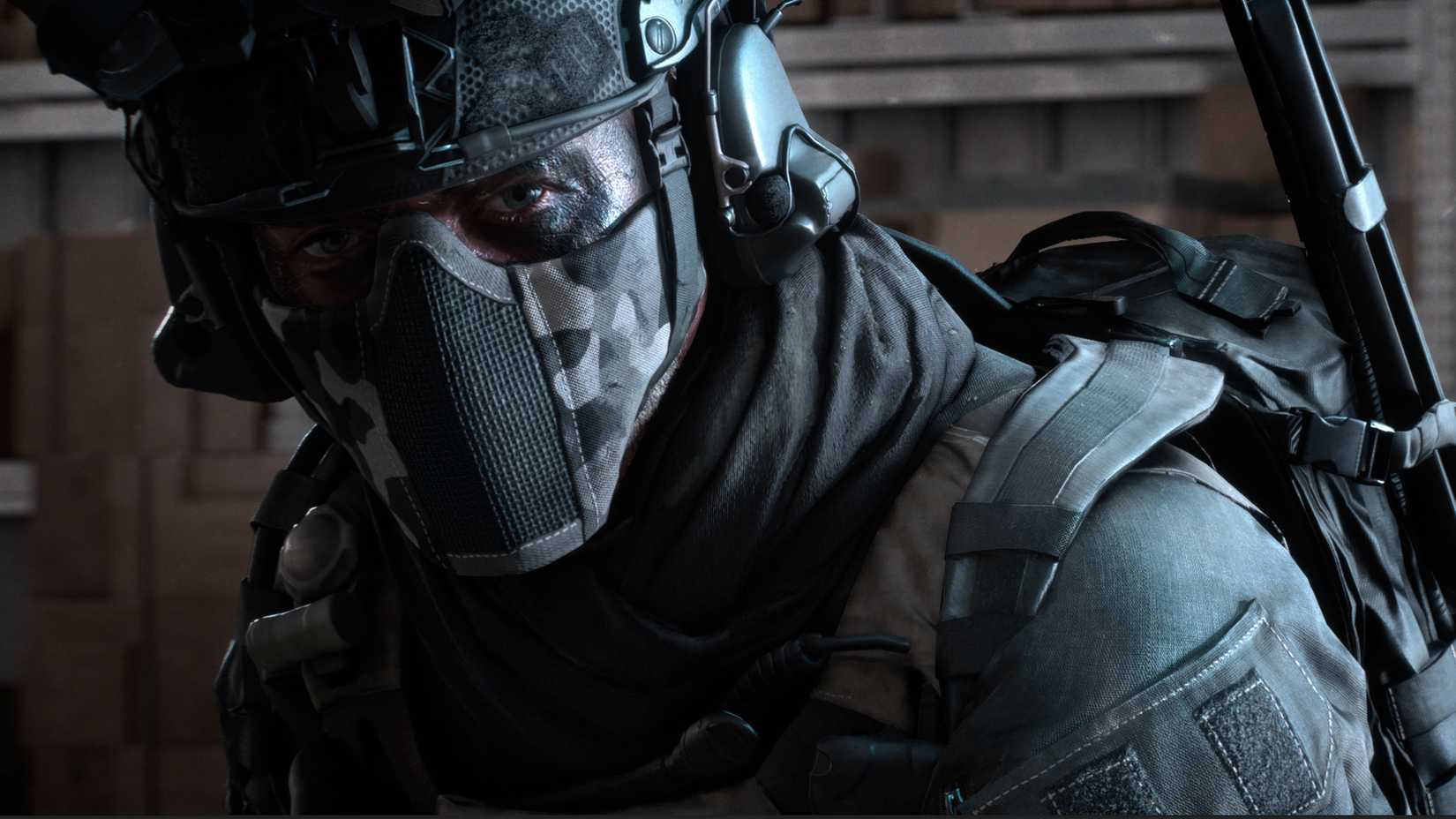 A close-up on Battlefield 6's Hemlock, who wears a mask covering most of his face and eye black obscuring what can be seen.