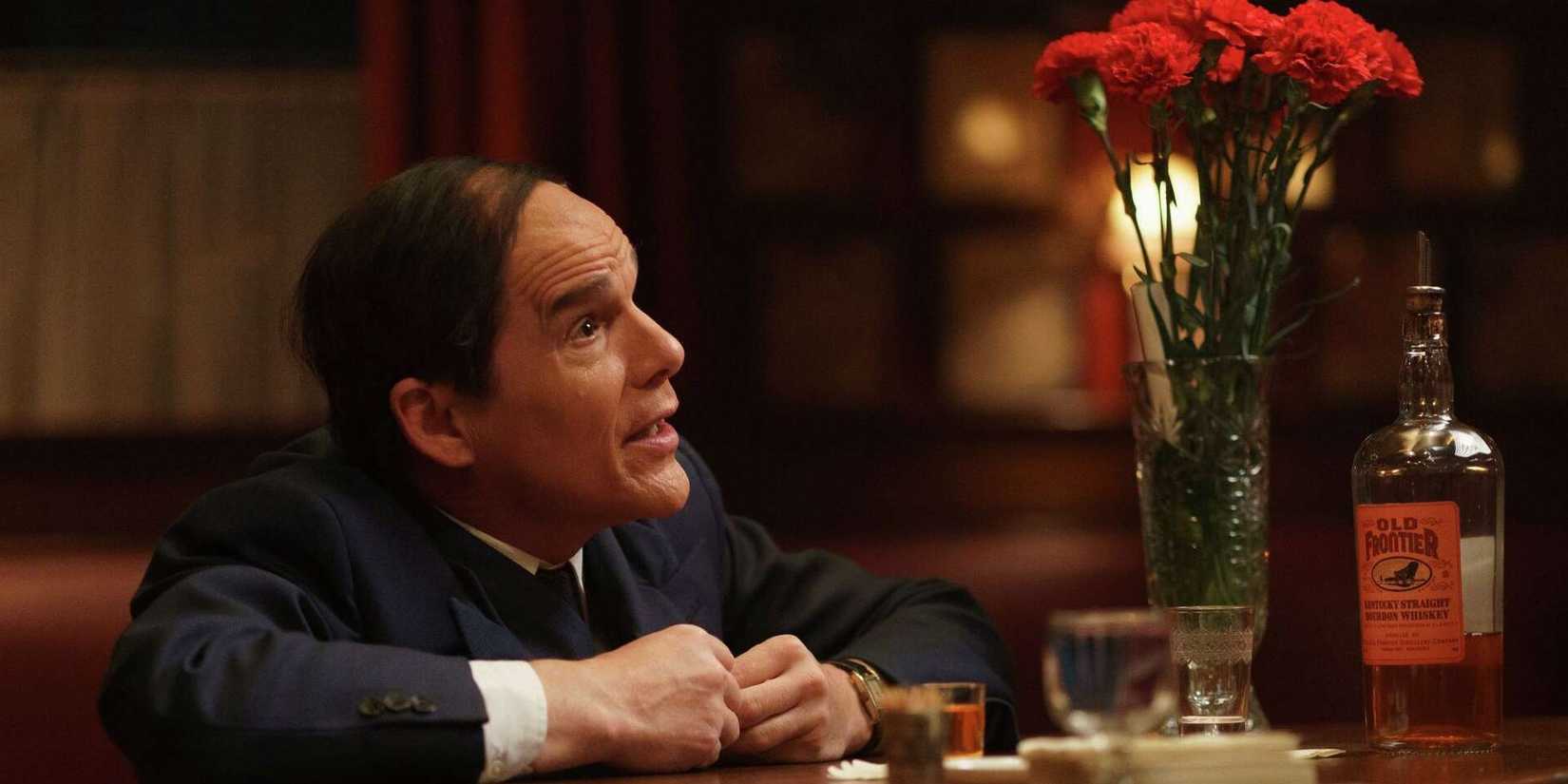 Ethan Hawke sitting at a bar in Blue Moon