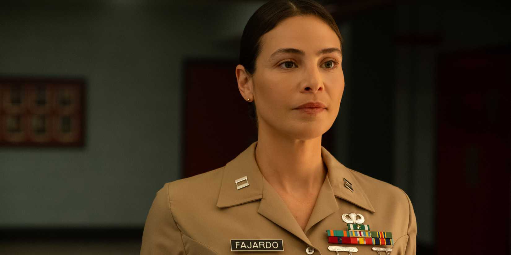Captain Fajaro looks to the side in Season 1 Episode 4 of Boots