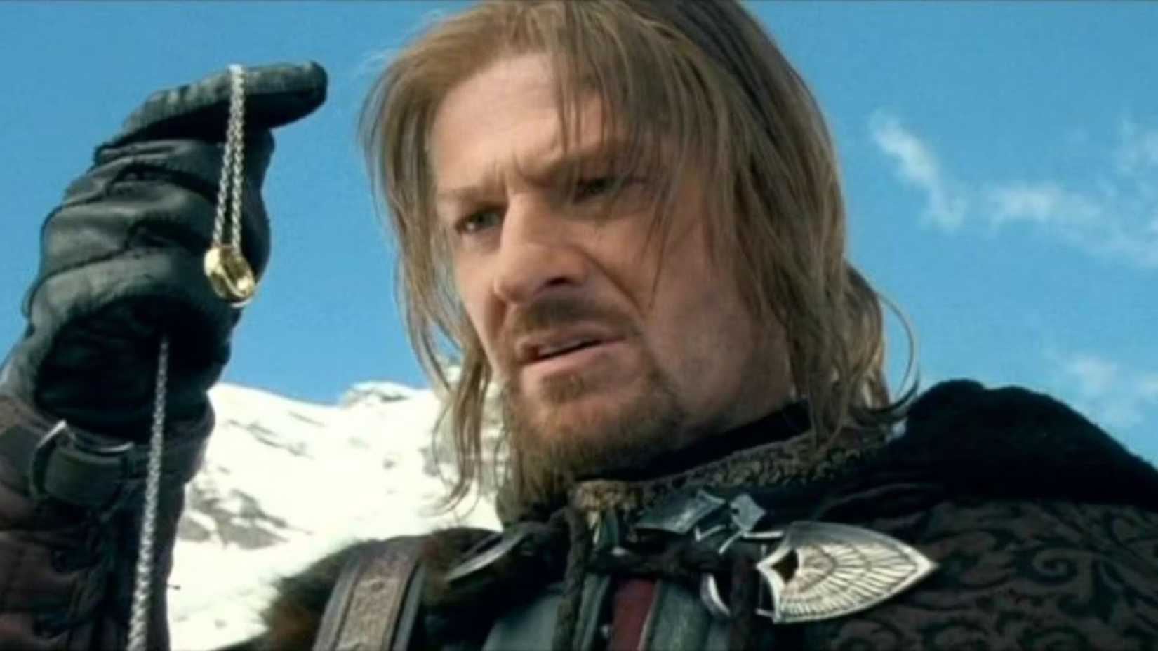 Boromir holding the Ring in Lord of the Rings