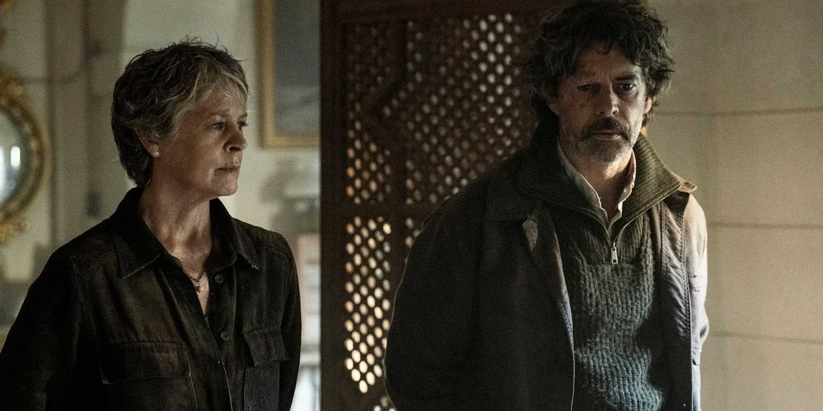 Carol (Melissa McBride) and Antonio (Eduardo Noriega) standing side by side looking glum in The Walking Dead: Daryl Dixon season 3