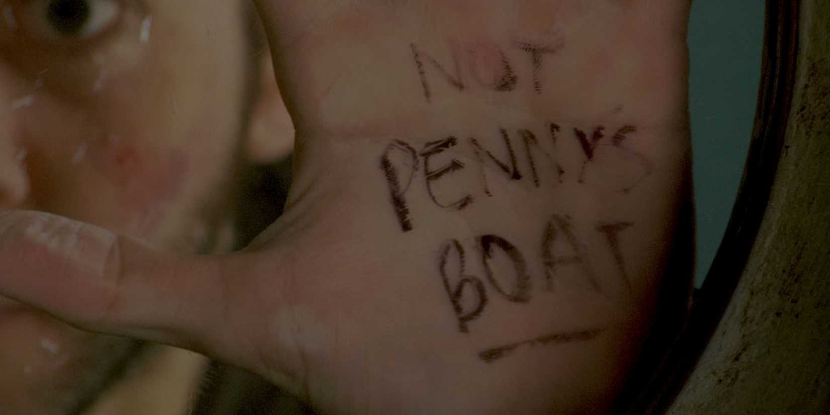 Charlie em Lost segurando a palma da mão para fora. Diz Not Penny's Boat