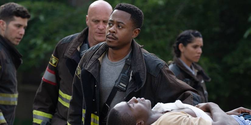 Darren Ritter (Daniel Kyri) helping Caleb (Chemlahyah Yisrael) in the Chicago Fire season 14 premiere