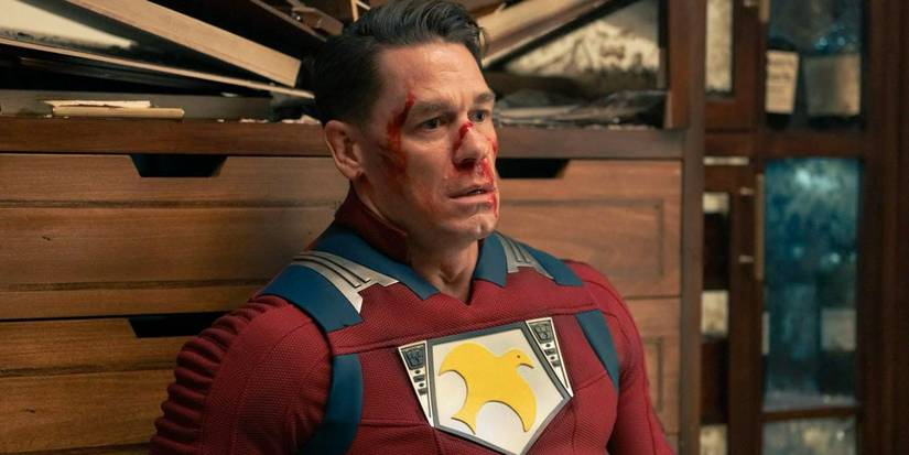 Chris Smith bloodied and looking traumatized in Peacemaker Season 2 Episode 7