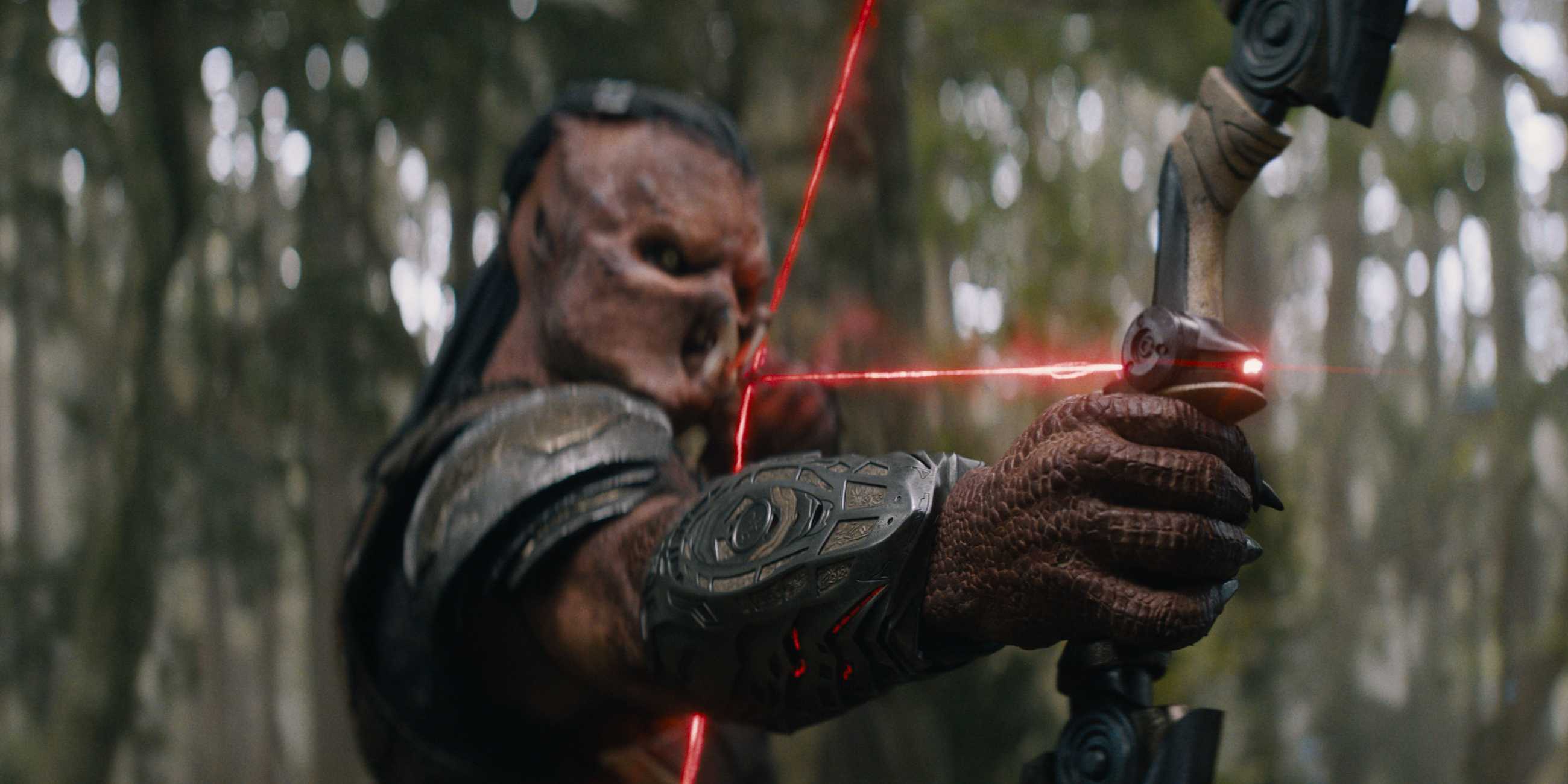 Dek shooting a bow and arrow in Predator Badlands