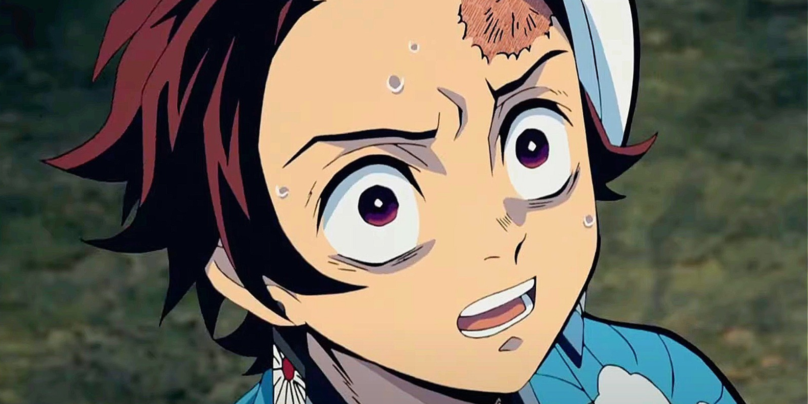 Imagem em destaque do anime Demon Slayer - Tanjiro parecendo completamente chocado e surpreso