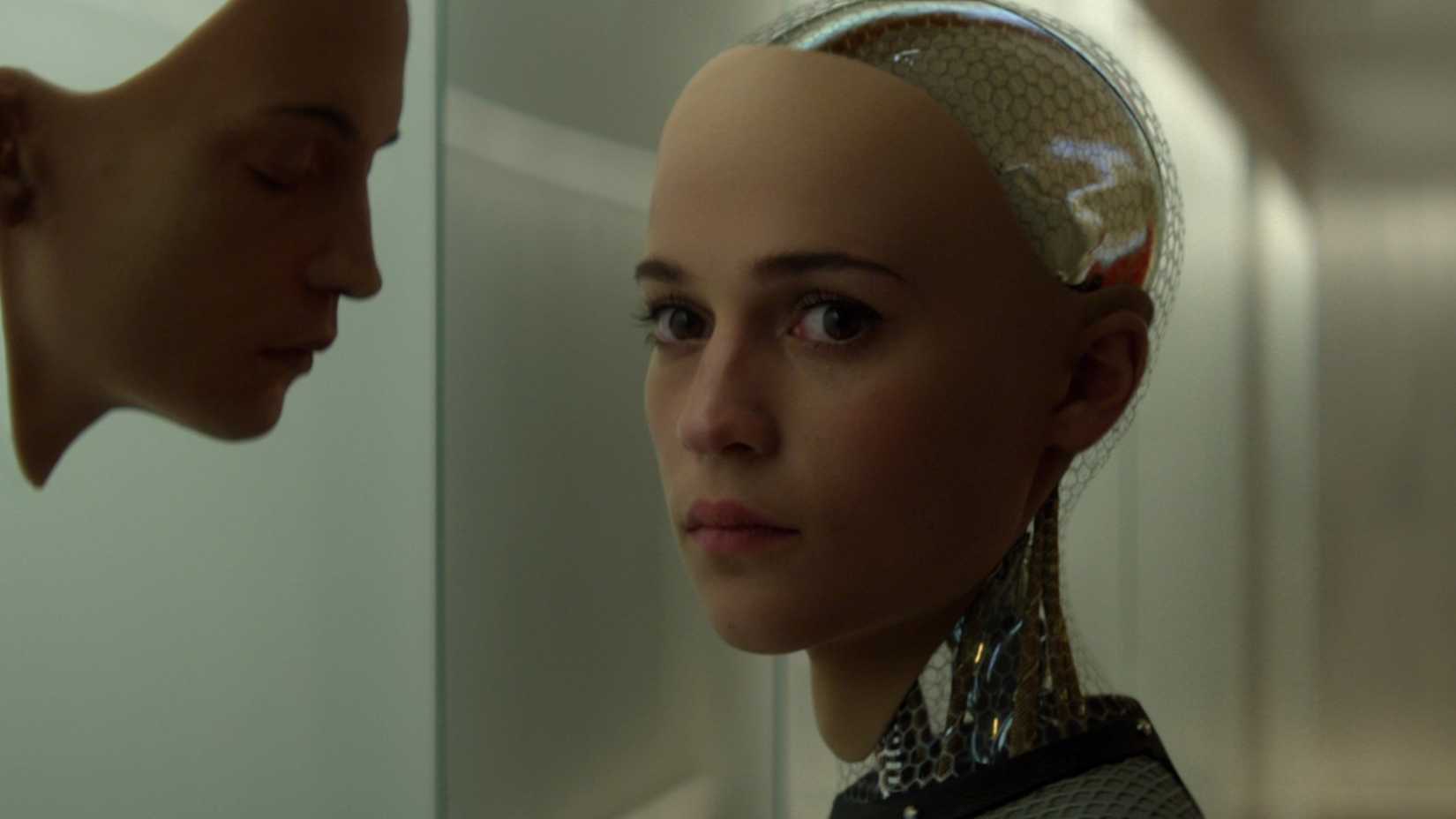 Alicia Vikander looks over her shoulder in Ex Machina