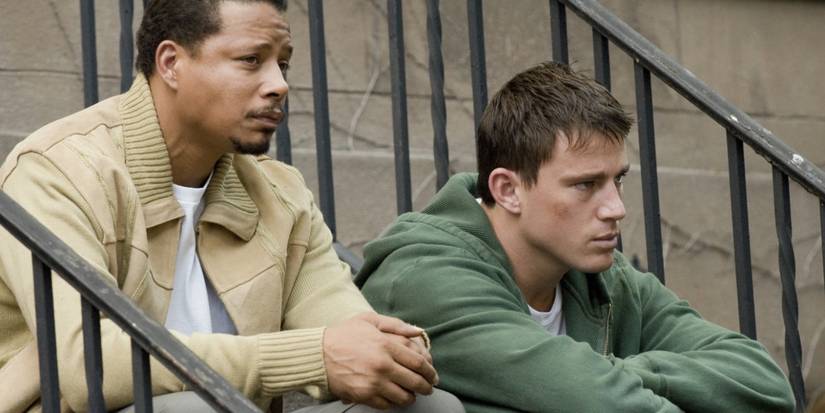 Channing Tatum and Terence Howard sitting together in Fighting