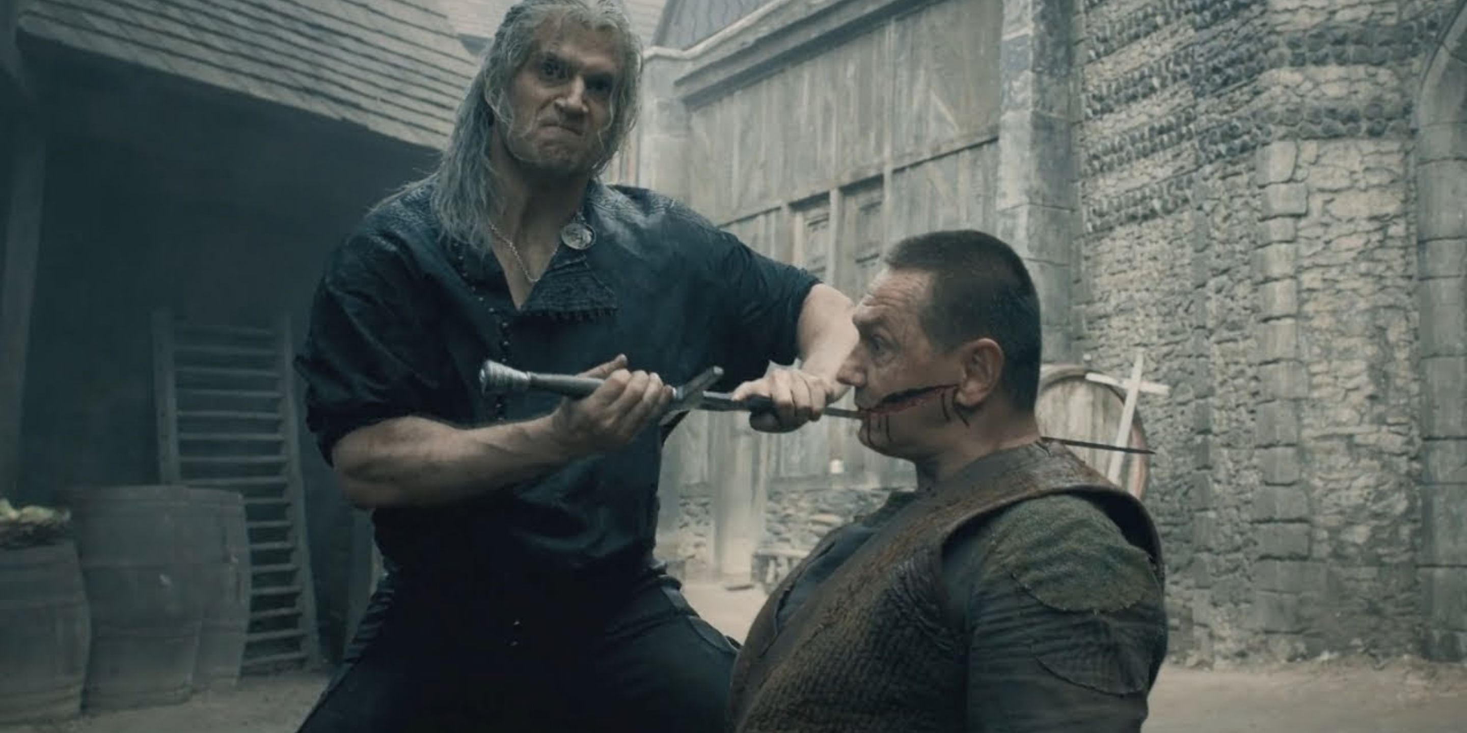 Geralt de Rívia em combate em The Witcher