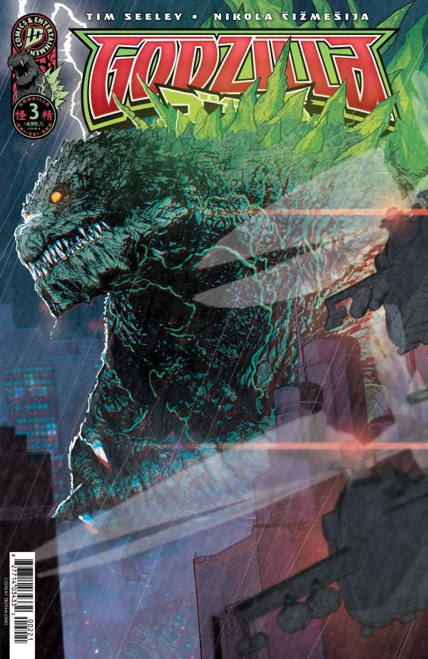 Gojira walks through a city in a thunderstorm in Godzilla #3