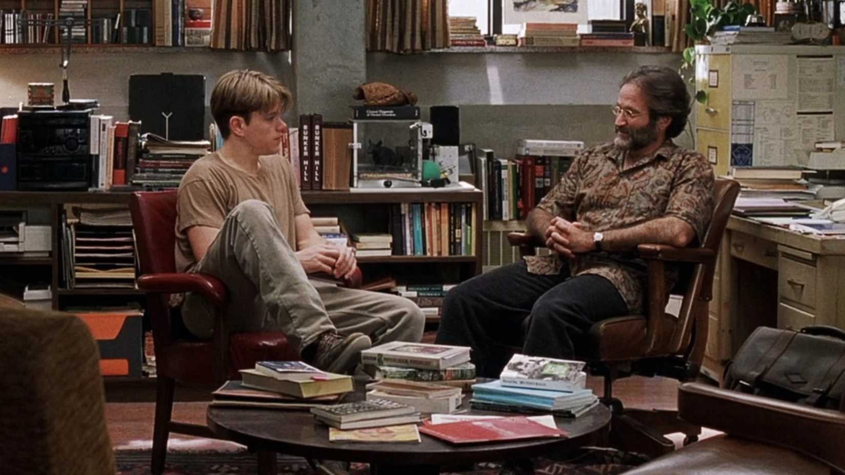 Matt Damon and Robin Williams talk in a cluttered office in Good Will Hunting