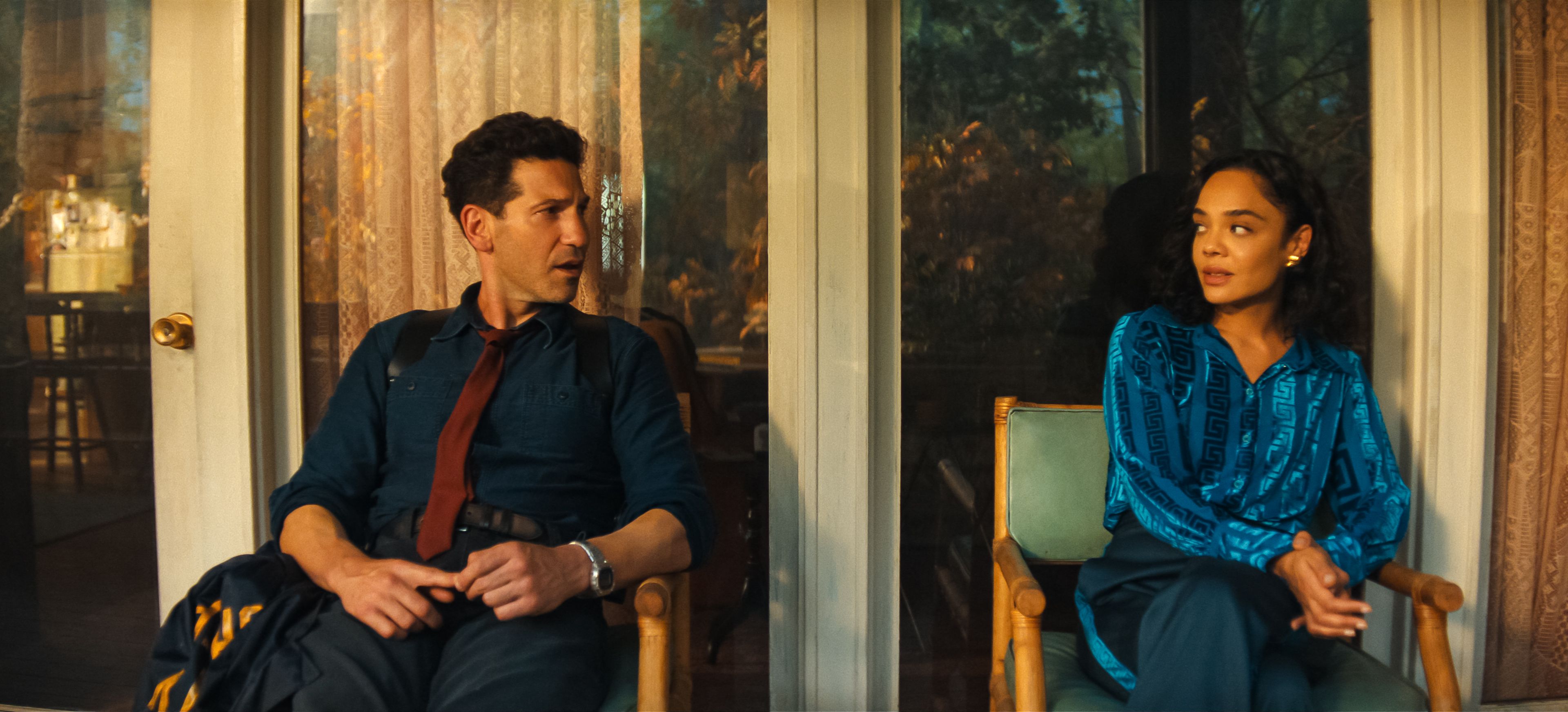 Jon Bernthal and Tessa Thompson looking suspiciously at each other in His & Hers