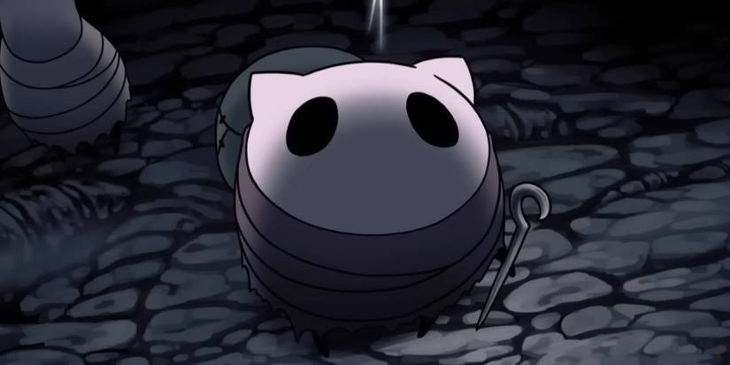 Hollow Knight Silksong bug NPC during one of the game's ending cutscenes