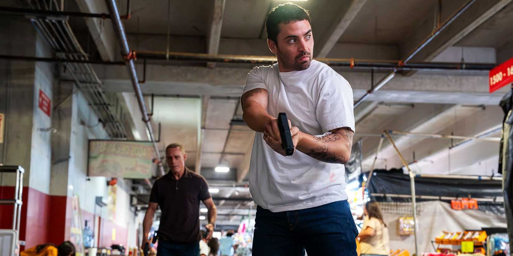 Jason Beghe as Hank Voight and Benjamin Levy Aguilar as Dante Torres in Chicago PD season 13, episode 2