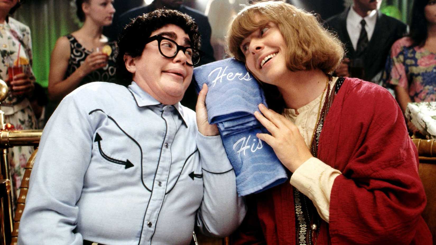 julia sweeny sitting with dave foley in it s pat