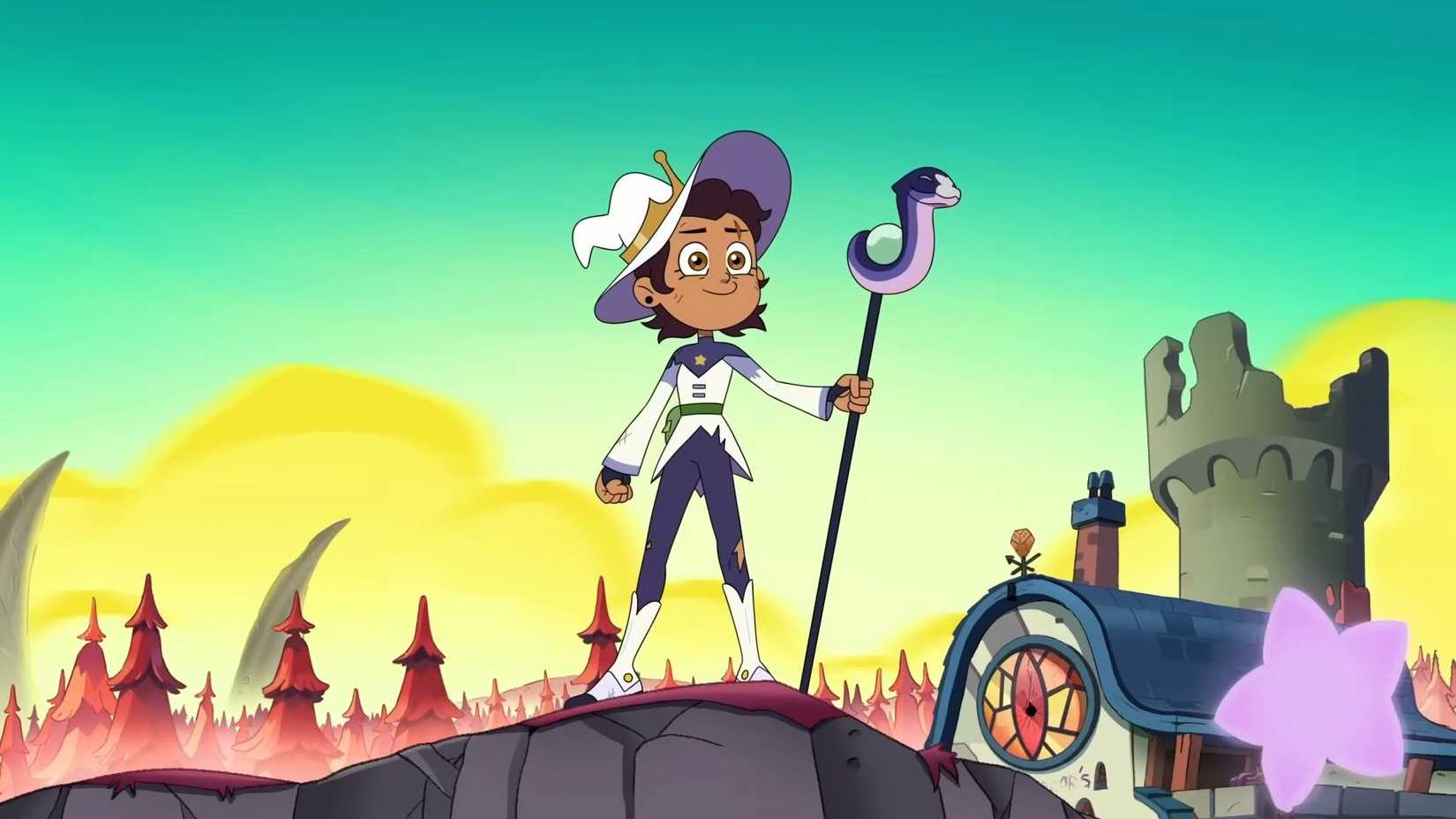 Luz, ubrana jako czarownica, stojąca triumfalnie w The Owl House