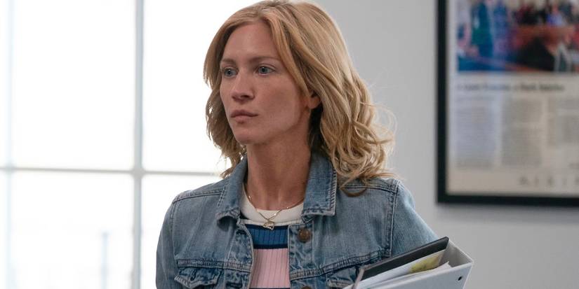 Mandy looks serious while holding a binder in Murdaugh Death in the Family