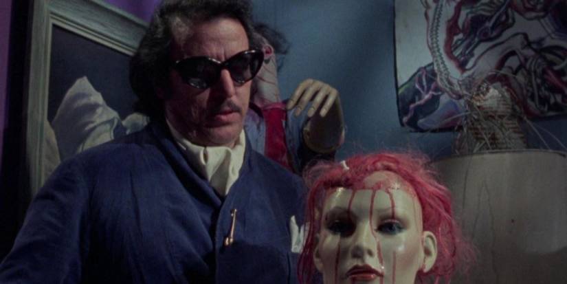 Joe Spinell talks to a bloody mannequin head in Maniac