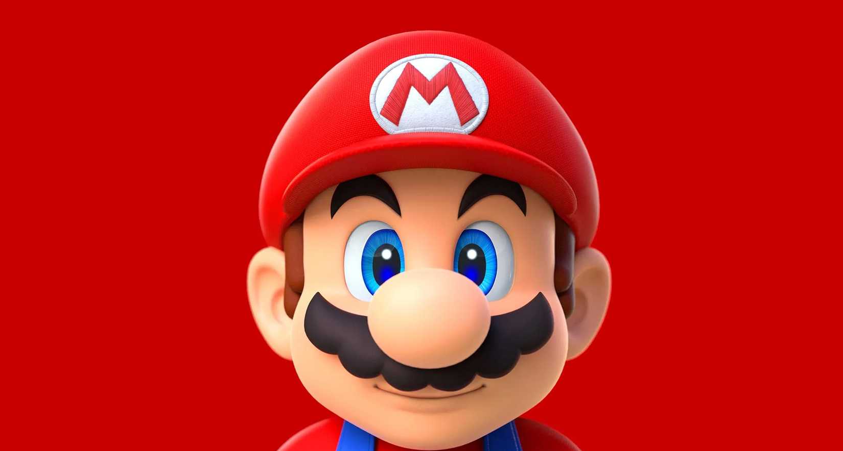 An image of Mario standing against a red background.