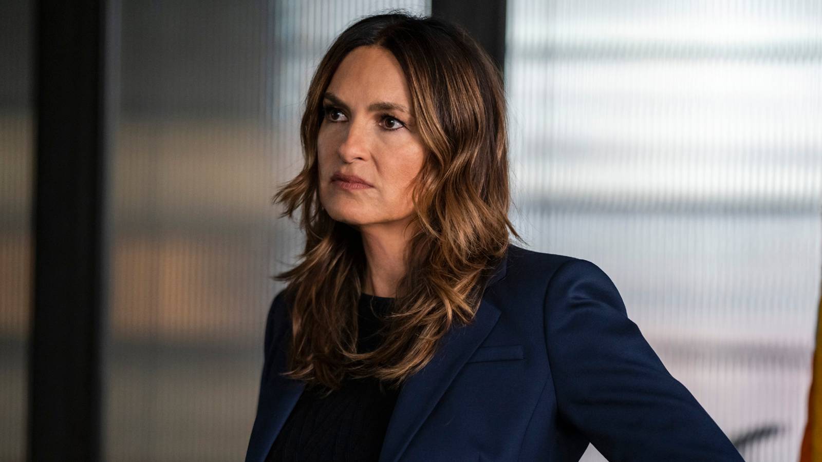 Mariska Hargitay as Olivia Benson with her hands on her hips looking serious in Law and Order Special Victims Unit