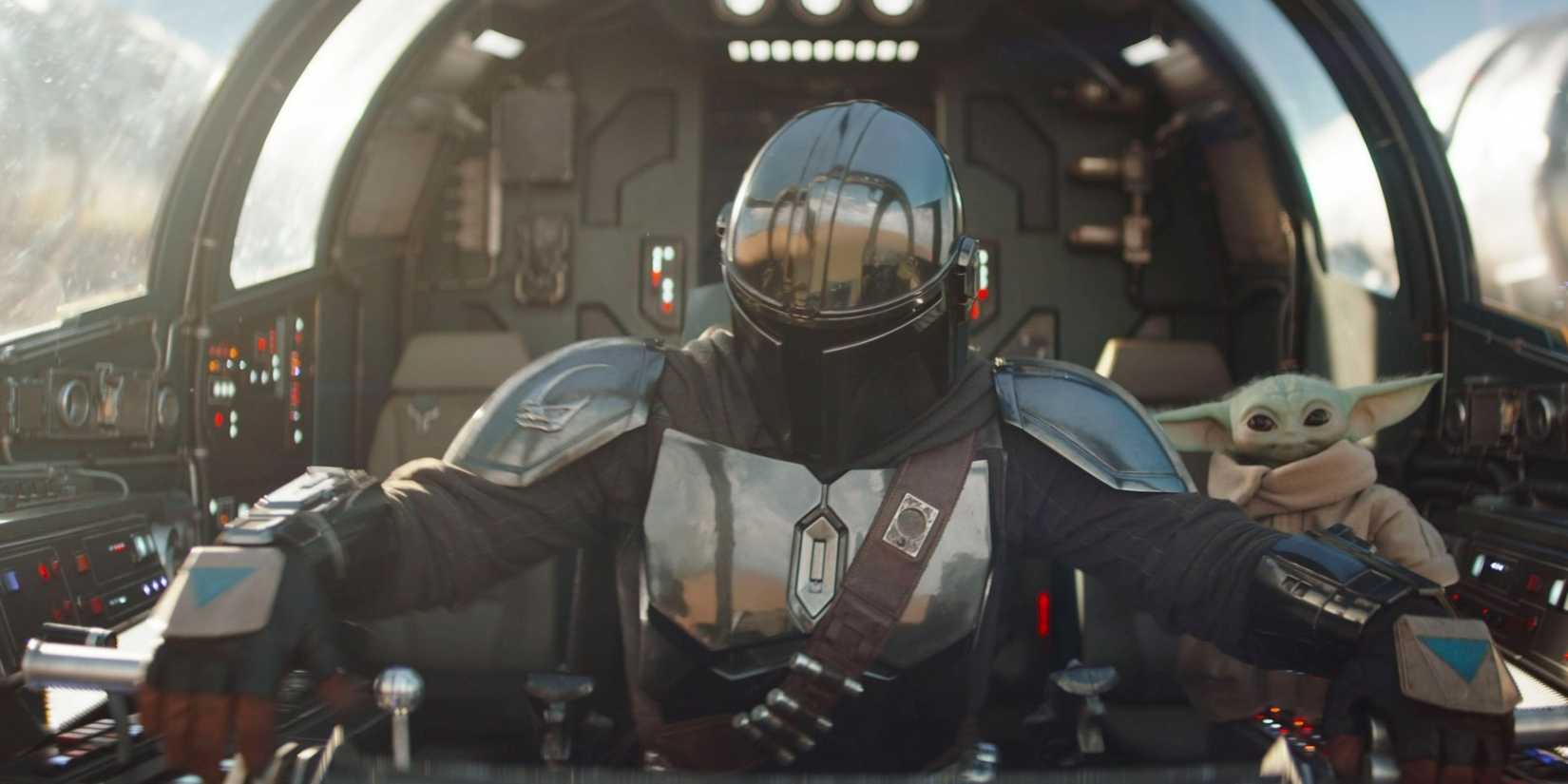 The Mandalorian and Grogu in a spaceship