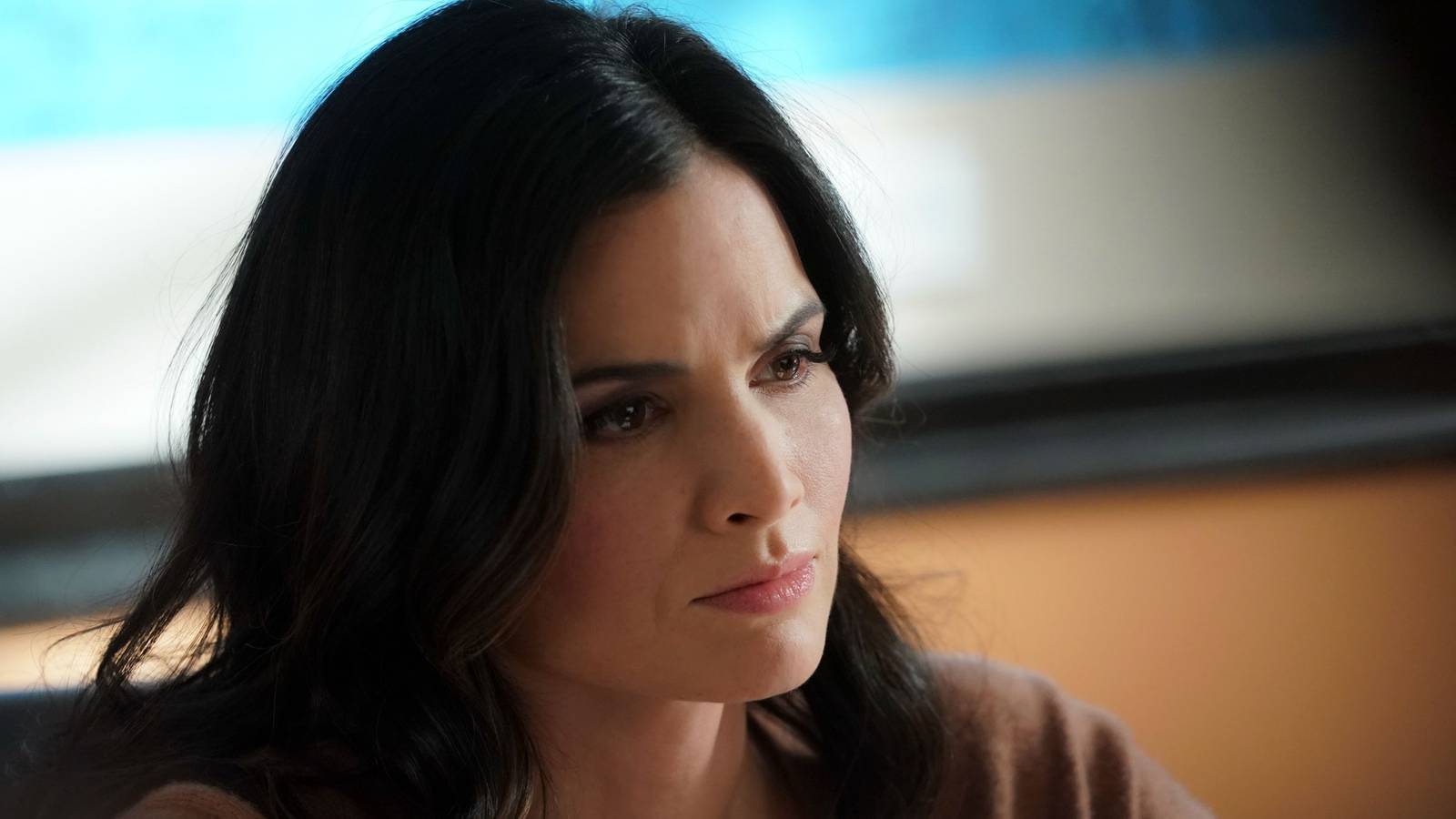 Jessica Knight (Katrina Law) looking concerned with something in NCIS.