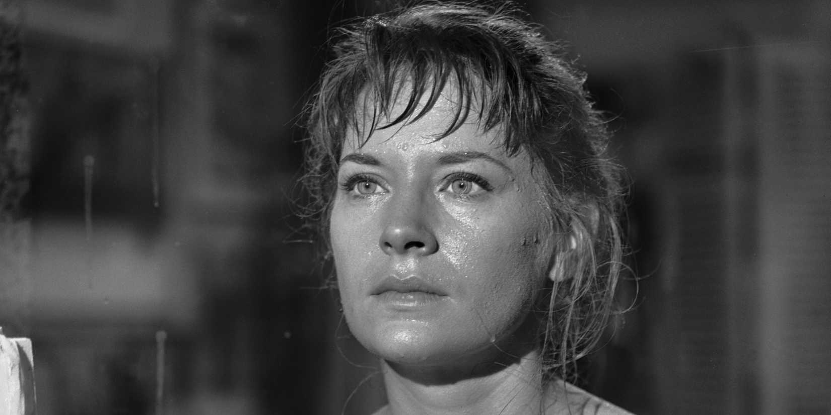 Norma looking out the window expressionless in The Twilight Zone episode The Midnight Sun